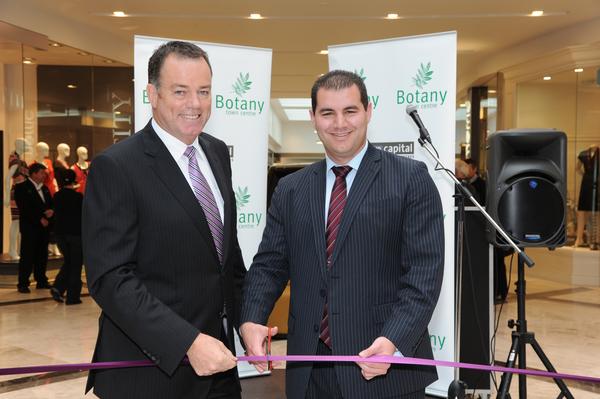 Stephen Costley General Manager AMP Capital Property Portfolio and Jami-Lee Ross MP for Botany cut the ribbon at the official opening